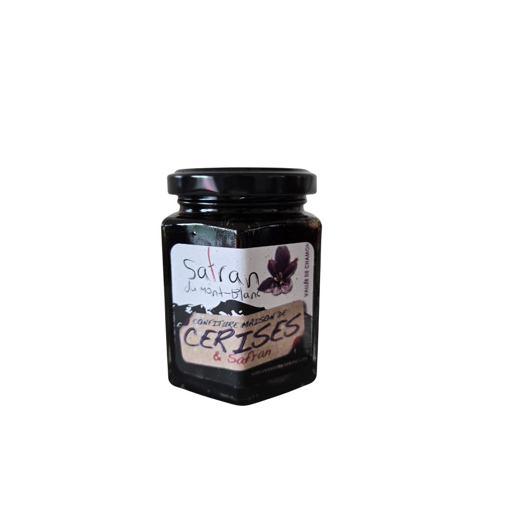 Jar of cherry jam with a label on a white background